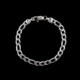 Silver chain bracelet on a black background