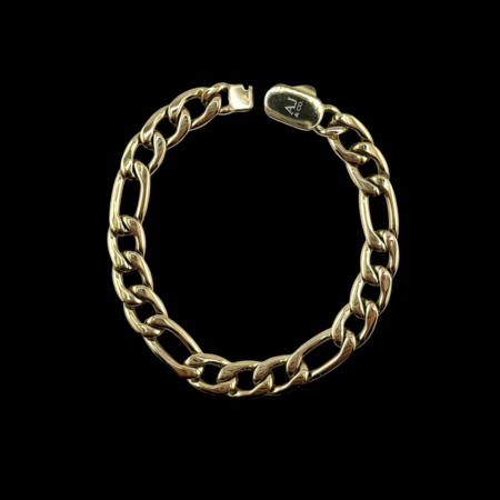 Gold chain bracelet on a black background