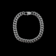 Bracelet chaîne en argent sur fond noir