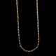 Collier chaîne en or sur fond noir