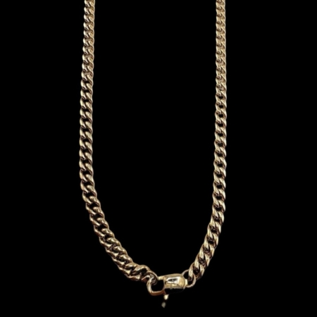 Gold chain on a black background