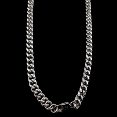 Silver chain necklace on black background